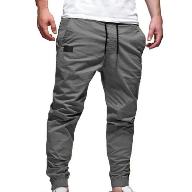 Stylowe męskie spodnie spodnie dresowe wiązane na kostkę w jednolitym kolorze spodnie do fitnessu