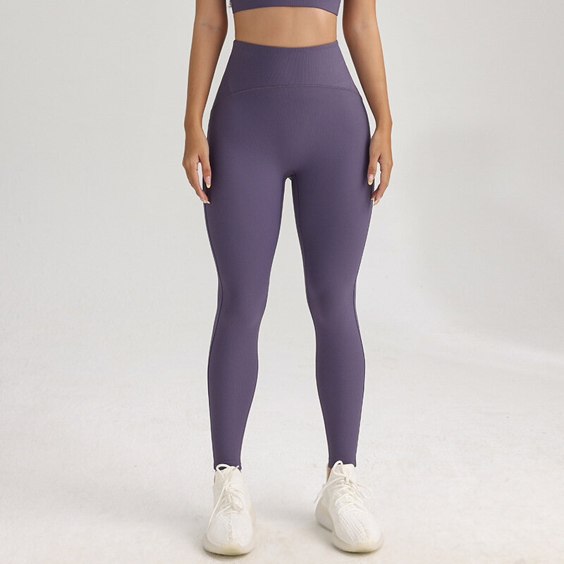 Leggings sportivi da donna pantaloni da Yoga a coste pantaloni da corsa per sollevamento dell'anca Slim pantaloni da allenamento per il controllo della pancia collant Fitness da palestra testurizzati
