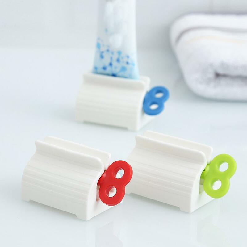 1ชิ้นหลอดบีบยาสีฟันพลาสติกใช้ในบ้านทำความสะอาดที่ยึดเครื่องจ่ายง่ายอุปกรณ์ E3B6กลิ้งในห้องน้ำ