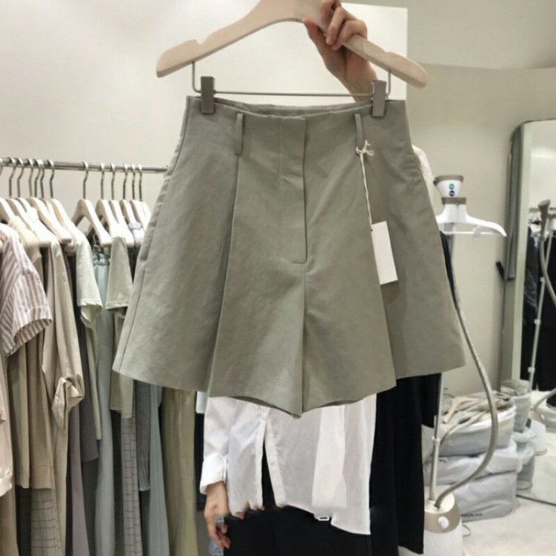 Dongdaemun Korea Selatan 2024 musim panas mode baru warna polos sederhana pinggang tinggi serbaguna kaki lebar pelangsing celana pendek kasual untuk Wom