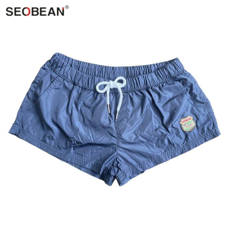 Seobean กางเกงชายหาดขาสั้นสำหรับผู้ชาย, กางเกงว่ายน้ำกางเกงขาสั้นบุรุษกางเกงเล่นยิมกางเกงขาสั้นแห้งเร็วสำหรับ Surf ใส่ในฤดูร้อน