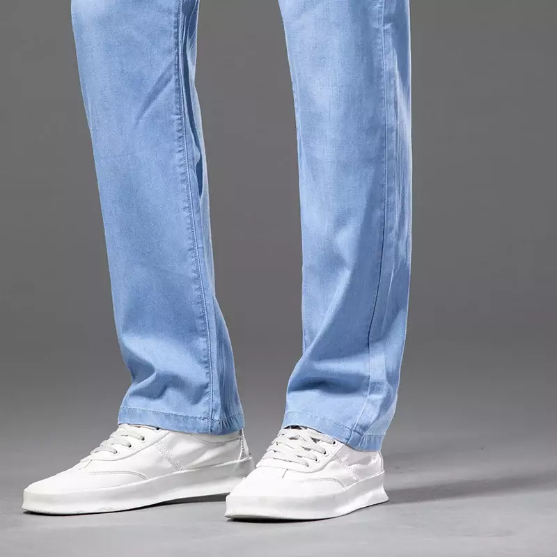 Letnie jeansy Lyocell męskie cienkie luźne proste spodnie dżinsowe lekkie spodnie niebieski klasyczny duży rozmiar 40 42 44
