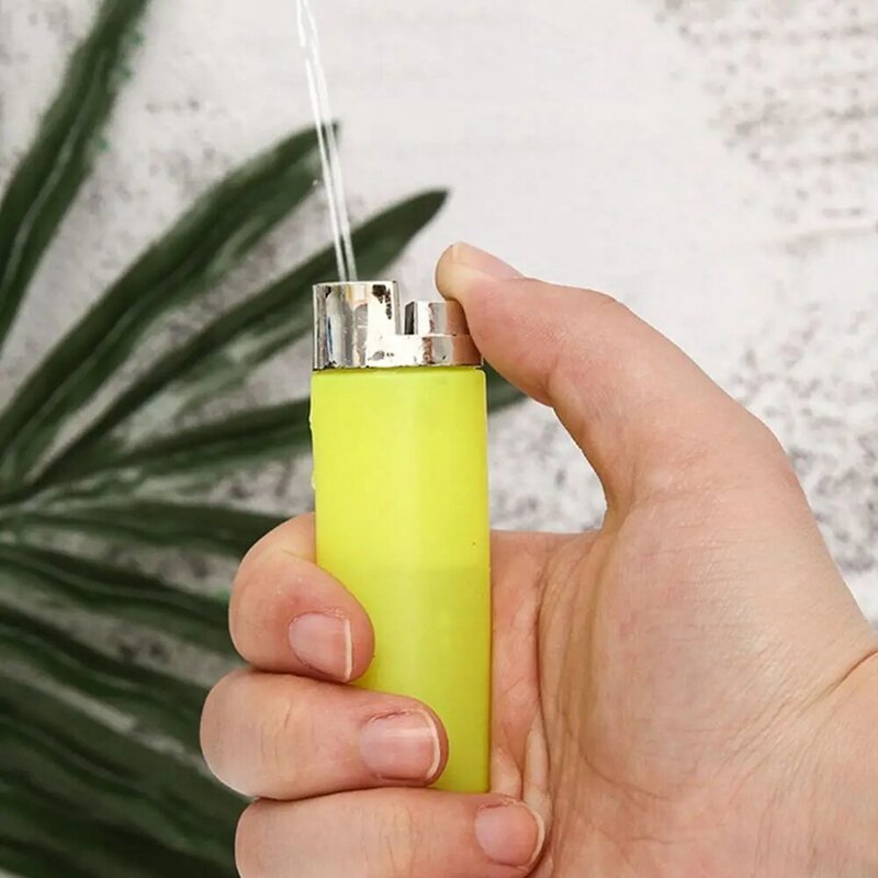 Briquet à jet d'eau créatif, 1 pièce, jouet, blague, astuce