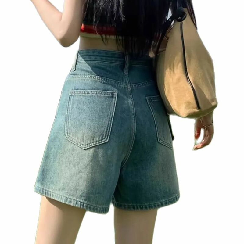 Celana pendek DENIM เอวสูงมีกระเป๋าขนาดใหญ่สำหรับผู้หญิงกางเกงยีนส์สีน้ำเงินแบบย้อนยุคกางเกงขาม้าขาตรงใหม่2024หลวม