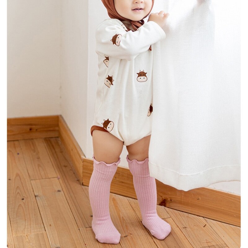 ถุงเท้ายาวถึงเข่าสำหรับเด็กทารกถุงเท้ายาวผ้าฝ้ายนุ่มสีทึบสำหรับเด็กใหม่