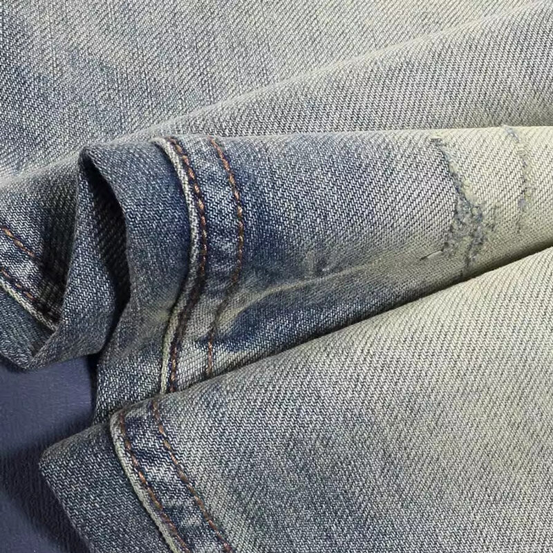 Jeans da uomo Vintage di moda Jeans strappati Slim Fit elasticizzati blu lavati retrò di alta qualità da uomo pantaloni in Denim firmati in stile italiano