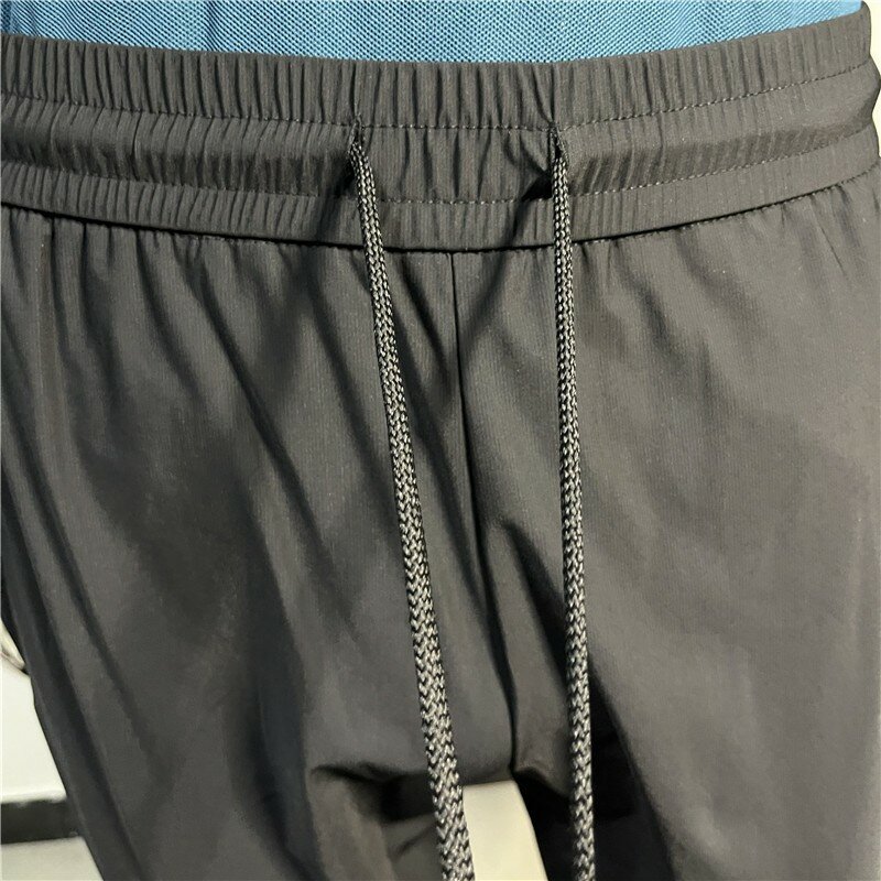 Plus Size 4 5XL pantaloni da Golf estivi in seta di ghiaccio da uomo pantaloni Casual ultrasottili elastici alti pantaloni sportivi da corsa ad asciugatura rapida