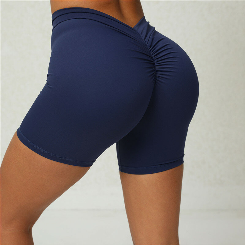 Tinta unita V Back Women Seamless Butt Lifting pantaloncini da palestra Quick Dry Training sport Fitness pantaloni da Yoga a vita alta pantaloncini