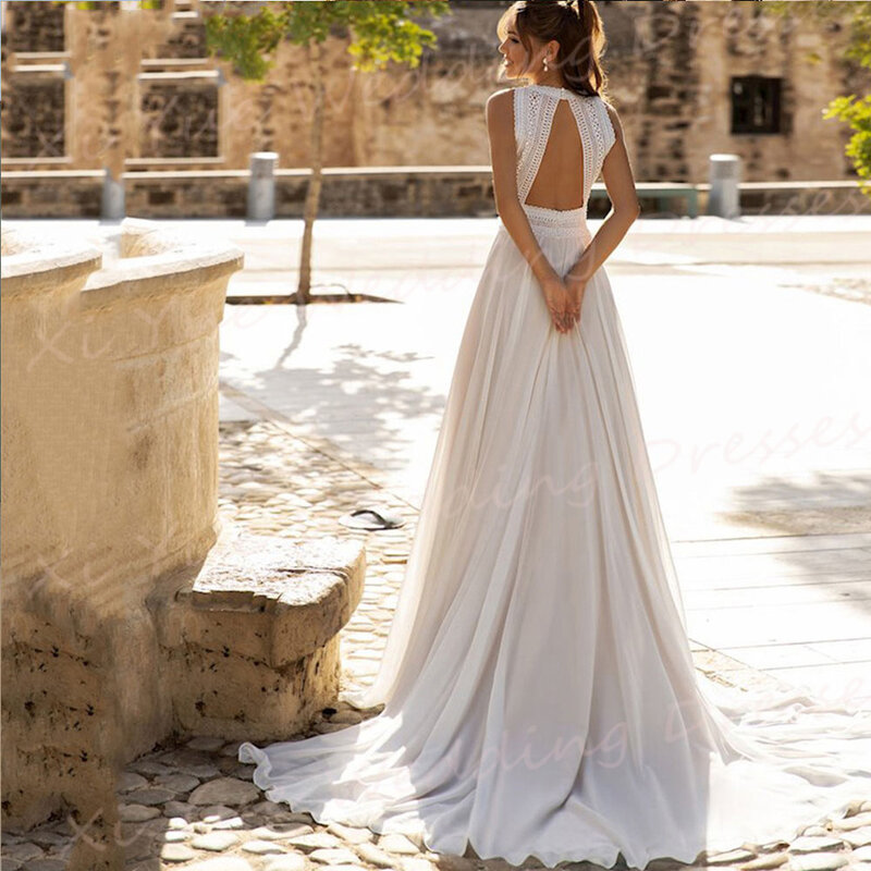 Artystyczne proste suknie ślubne z okrągłym dekoltem nowoczesne koronkowe bez rękawów szyfonowe suknie ślubne bez pleców sukienki na zamówienie de Novia