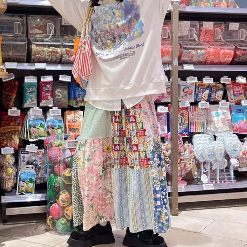 W koreańskim stylu z nadrukiem kolorowa pół spódniczka damska 2024 wiosenna letnia tkanina patchworkowa luźno dopasowane wysoka talia spódnica w kształcie linii
