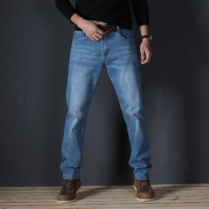 Celana Jeans elastis pria, celana Denim elastis lurus ukuran besar 48 gaya sederhana hitam biru regang ukuran besar celana pensil 2024