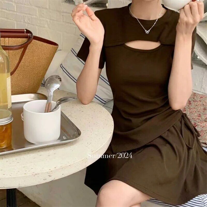 2024 Summer New Age Reduction Fashion Irregular Flesh Hollow-out T-shirt Top Set For Women + sports Skirt Two-piece Set Tide