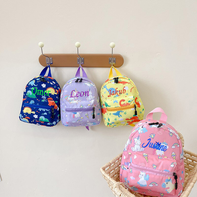 Mochila personalizada para niños, bolso de tela Oxford con patrón de dinosaurio de dibujos animados, mochila para bebé de jardín de infantes