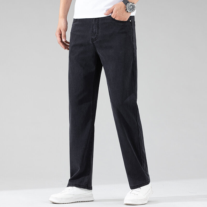 Klassische schwarze gerade Lyocell Jeans für Männer Sommer dünne weiche bequeme elastische lose Eis Seide Jeans hose Marken kleidung