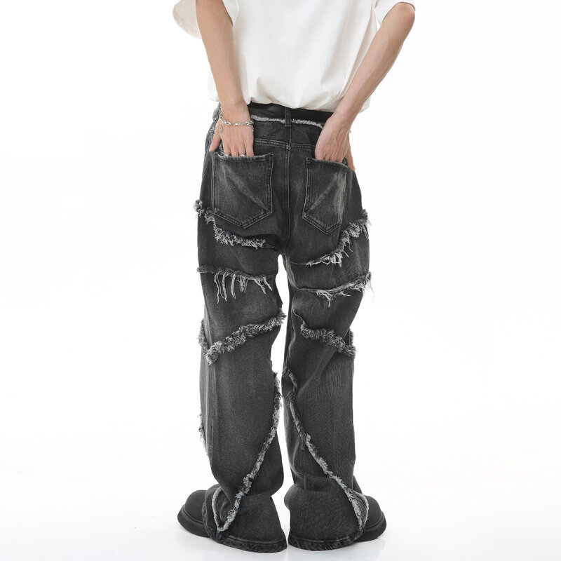 Celana jeans pria Eropa dan Amerika 2023, produk kepribadian tren hip-hop berjumbai longgar kaki lebar