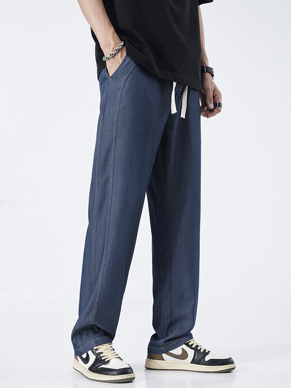 Letnie cienkie szerokie spodnie męskie luźne sznurki elastyczne w talii niebieskie modne na co dzień spodnie ze stretchem męskie duże M-5XL