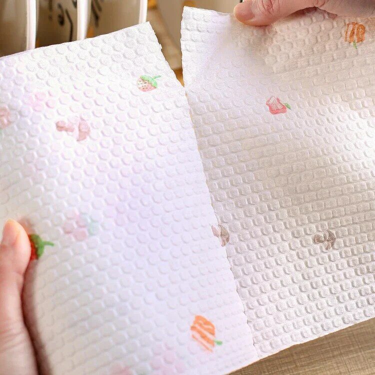 กระดาษเช็ดแบบม้วน50-100แผ่นผ้าเปียกแห้งแบบใช้แล้วทิ้งผ้าเช็ดแบบนอนวูฟเวนอเนกประสงค์ผ้าซับน้ำได้ดีผ้าขนหนูสำหรับเด็ก