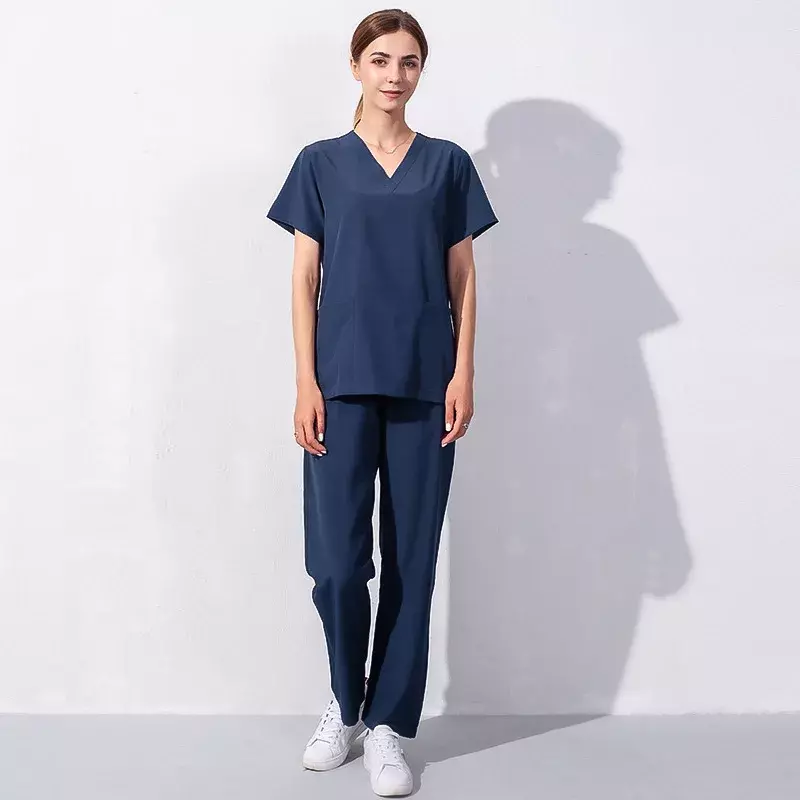 Neuankömmling Tierklinik Uniform Set Peeling passt einfarbig Unisex OP-Kleid Tasche V-Ausschnitt Peelings Set für Frauen Jogger