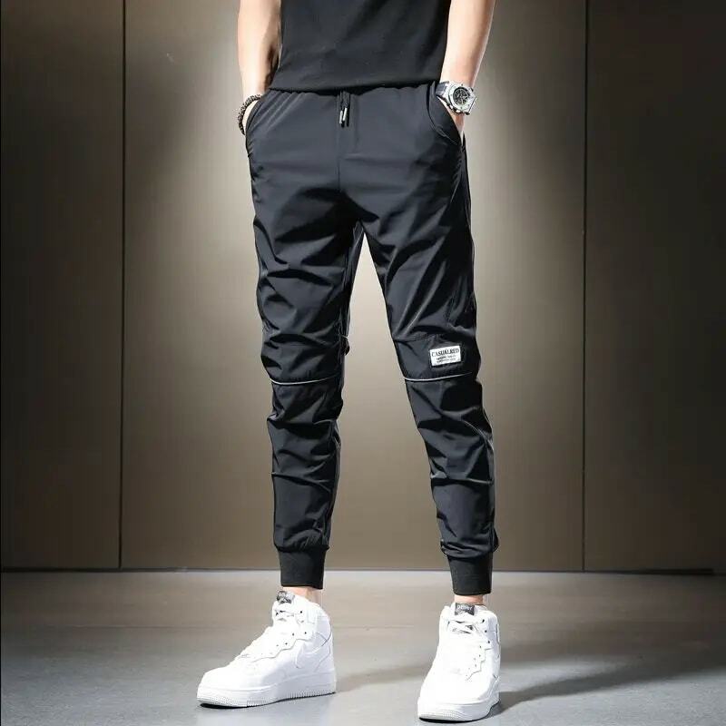 Letnie 2023 codzienne męskie spodnie czarne szare spodnie ze sznurkiem lekkie oddychające szybkoschnący lodowy jedwab odzieży sportowej