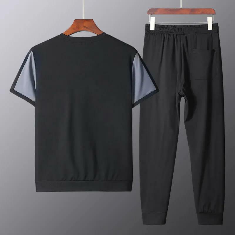 Ubrania dla mężczyzn letnie spodnie z krótkim rękawem dwuczęściowe klasyczny modny strój sportowy na co dzień