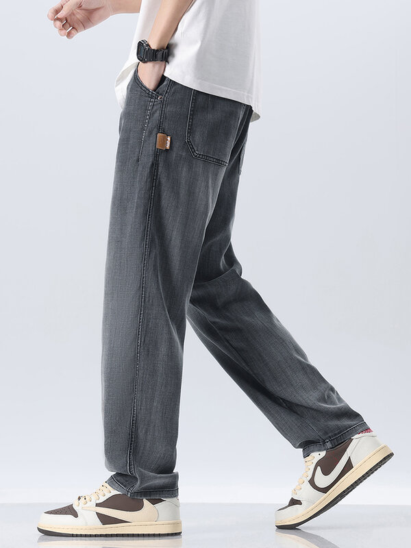 Lyocell celana Jeans tipis pria, celana Denim longgar kasual lurus lembut musim panas 28-38