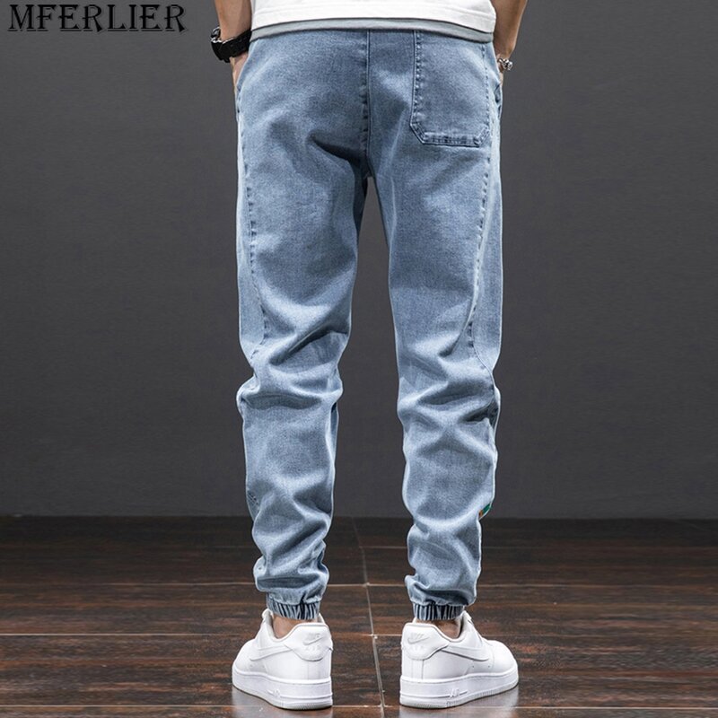 Celana panjang Denim pria, Jeans Jogger pria ukuran besar 8XL, celana Denim modis kasual pinggang elastis warna Solid ukuran besar 8XL