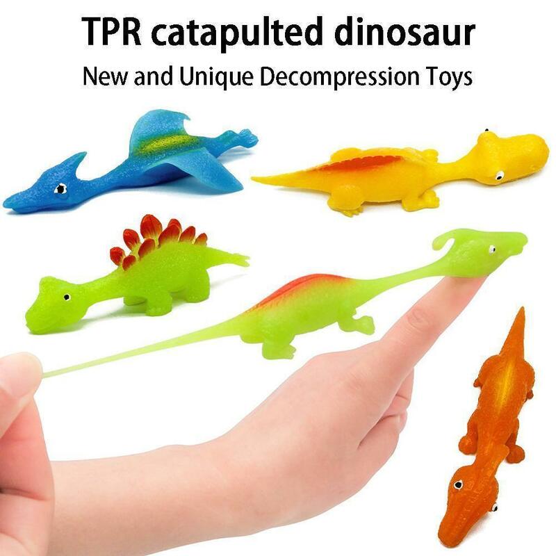 大人と子供のための創造的な指のカタパルト恐竜スリンショット、ストレス解消のための粘着性の壁のおもちゃ、5個、25個、50個