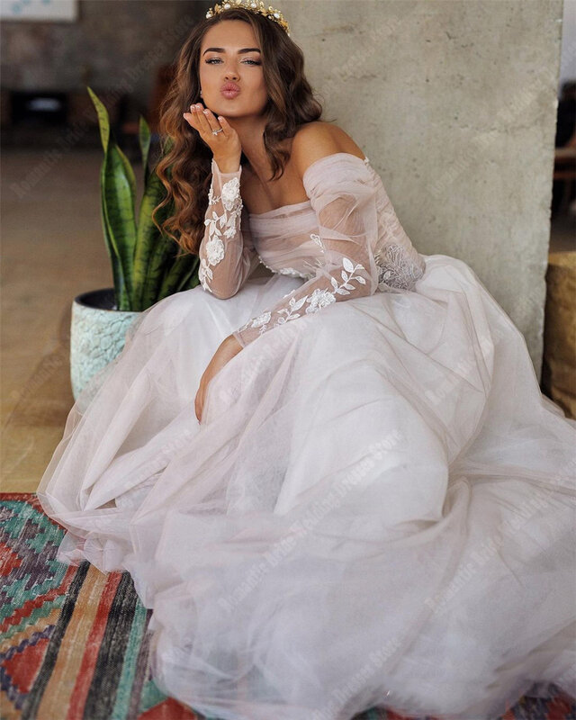 Eleganckie długie rękawy suknie ślubne jasne tiulowe suknie ślubne bez pleców nowe linie do mopowania długości damskie długie Vestidos De Novia