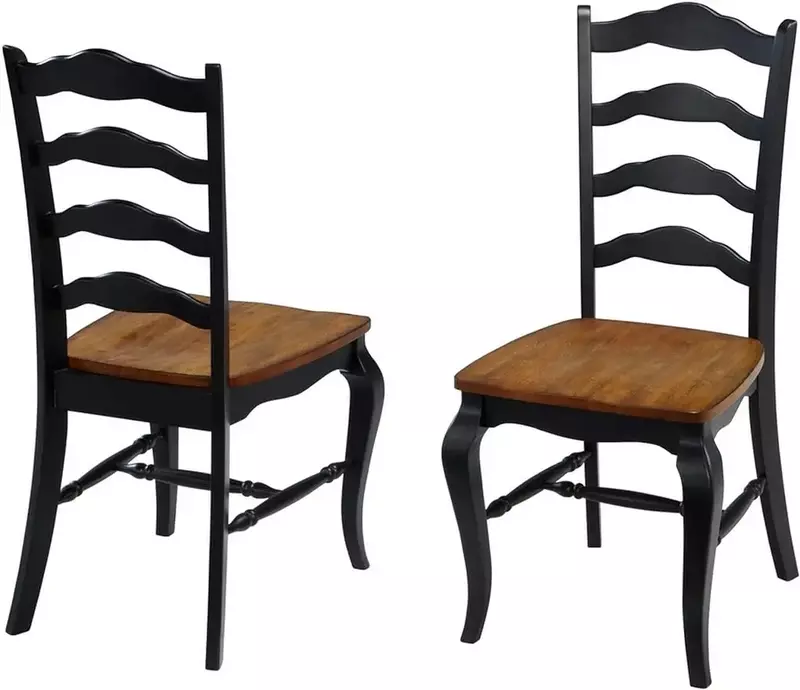 Par de sillas de comedor de roble francés y negro, asiento contorneado de roble desgastado, acabado negro frotado y diseño de pata francesa