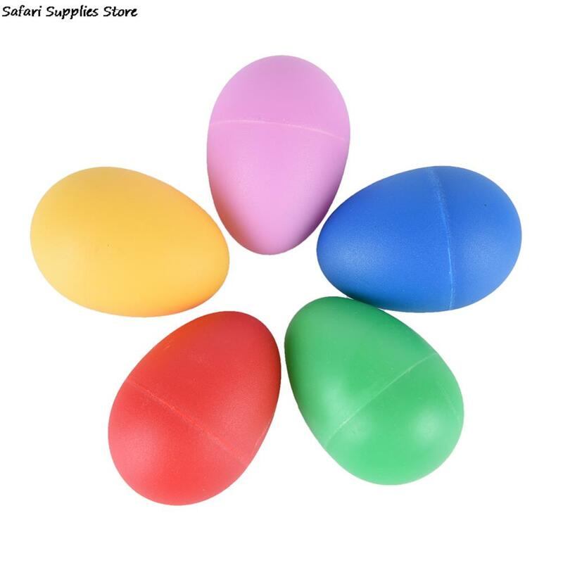 Kolorowe plastikowe perkusyjne marakasy Shaker dźwięk muzyczny jajko Instrument muzyczny dziecko maluch Childre Toy