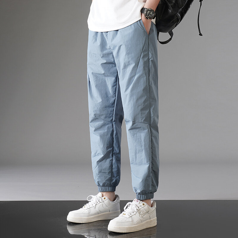 Pantalones cómodos informales de Color sólido para hombre, pantalón coreano Multicolor, cintura elástica, cordón, jóvenes, combina con todo, novedad de verano