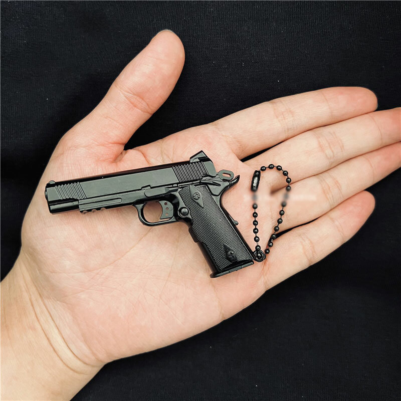 พวงกุญแจปืนไรเฟิลโลหะ1:3ใหม่มีหลายประเภทกันความเครียดรุ่นเล็กเบเร่ต้า92F โคลท์1911กล็อค17 kado ulang tahun