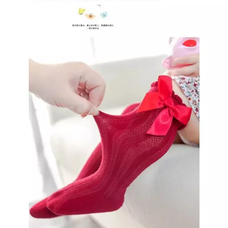 Czerwona muszka kolano skarpetki rurki do kolan dziewczęce torebki świąteczne niemowlęta miękkie bawełniane dziecięce skarpetki antypoślizgowa podłoga prezent dla dziecka