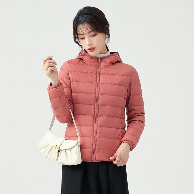 Piumino Casual portatile da donna invernale giacca da esterno con cappuccio antivento e Versatile giacca da donna Slim-fit isolata