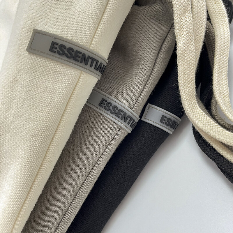 Nowa marka modowa Essentials spodnie dresowe gumowe litery Logo Hip Hop luźna bluza z kapturem spodnie do joggingu Unisex luksusowy styl Sweatpant