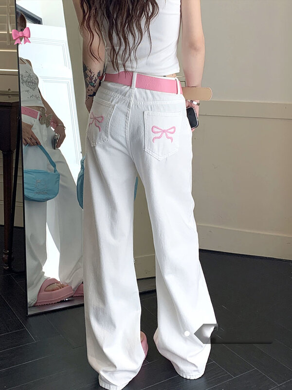 Koreański szykowny wiosenny nowy niszowy wszechstronny haft różowa kokardka dżinsy z szeroką nogawką długie spodnie dla kobiet 2024 spodnie