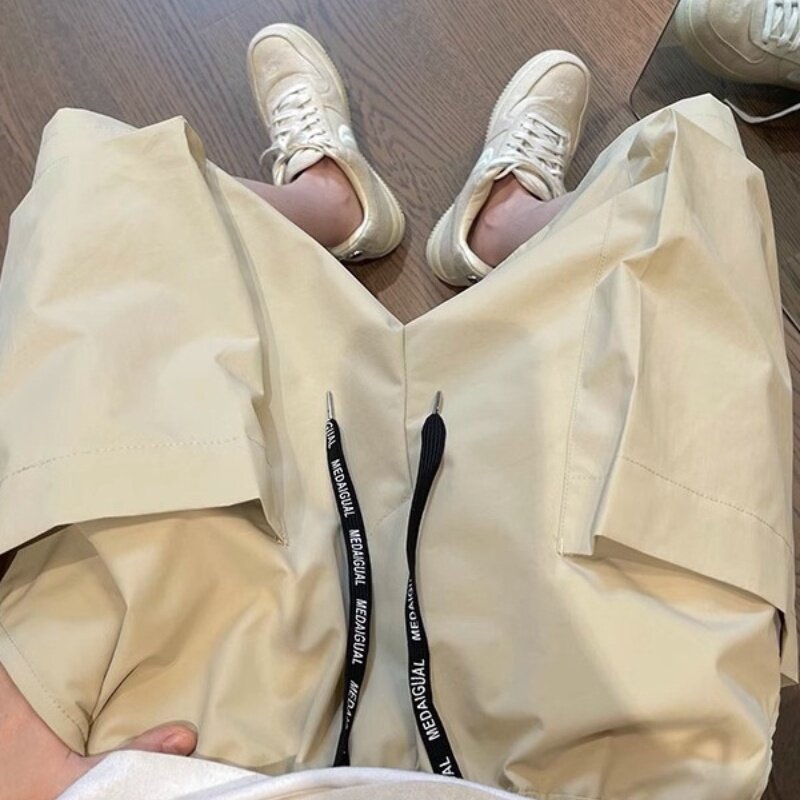 กางเกงขาสั้นลำลองของผู้ชายกางเกงวอร์มกางเกงขาสั้นมีกระเป๋าสำหรับฤดูร้อน2024ใหม่