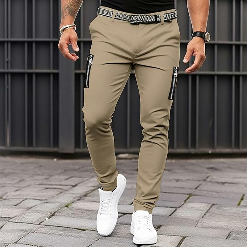 Pantalones de Color sólido con cremallera para hombre, pantalones de Jogger ajustados de cintura media con botón de tela transpirable, decoración informal