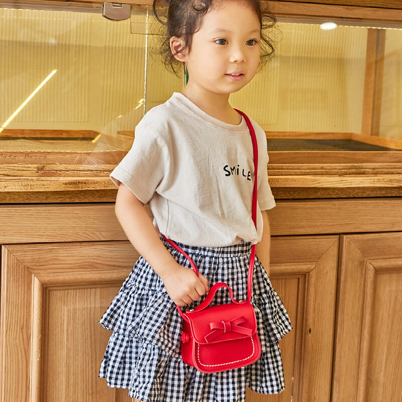 Nuove borse a tracolla per bambini in pelle bambini bambini ragazze borsa a tracolla principessa borsa a mano Solid Bowknot Princess portamonete