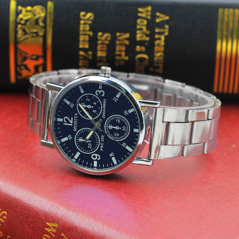 นาฬิกาข้อมือคุณภาพดีนาฬิกาเส้นบะหมี่สีดำแฟชั่นสีฟ้าใสทำจากเหล็กสีฟ้านาฬิกาแก้วเรืองแสงสีฟ้า