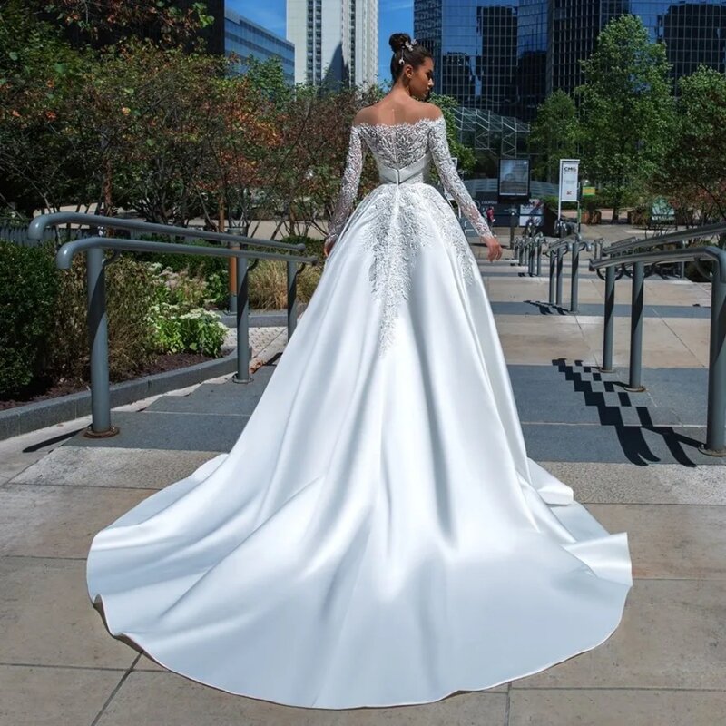 Eleganckie koraliki koronkowe suknie ślubne bez rękawów z długimi rękawami ślubne suknie dworskie satynowe z aplikacjami vestido de novia