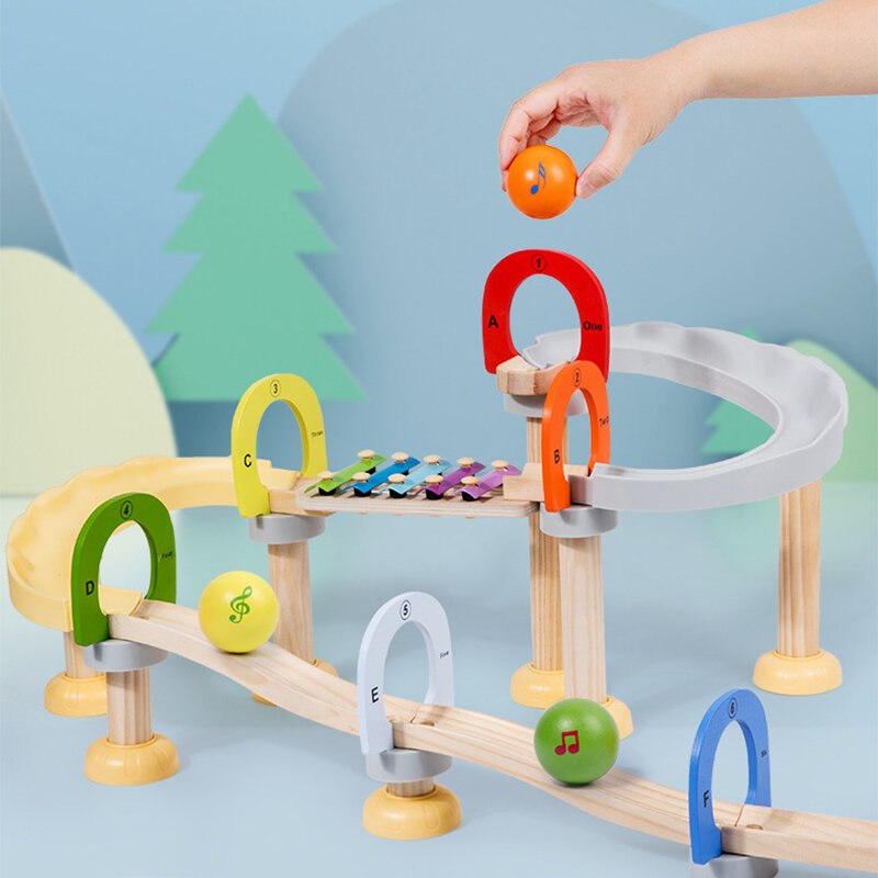 Legno musica percussione pianoforte palla pista Roller Ball Assembly Building Blocks educazione precoce bambini intelligenza giocattoli in legno