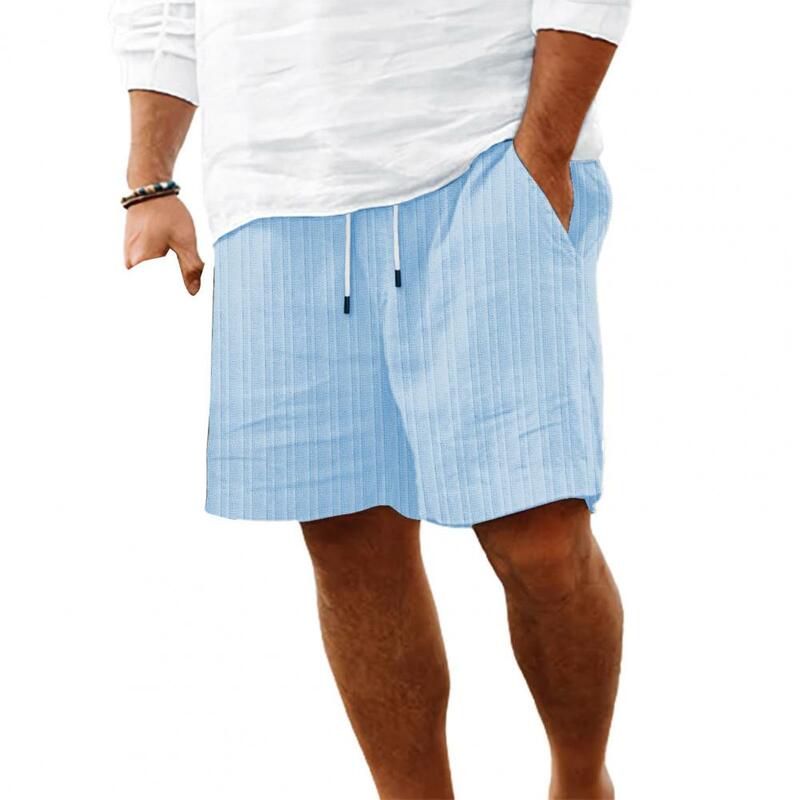 Celana pendek pria musim panas celana pendek serut dapat diatur pinggang elastis kasual dengan kantung diperkuat celana pendek kaki lebar