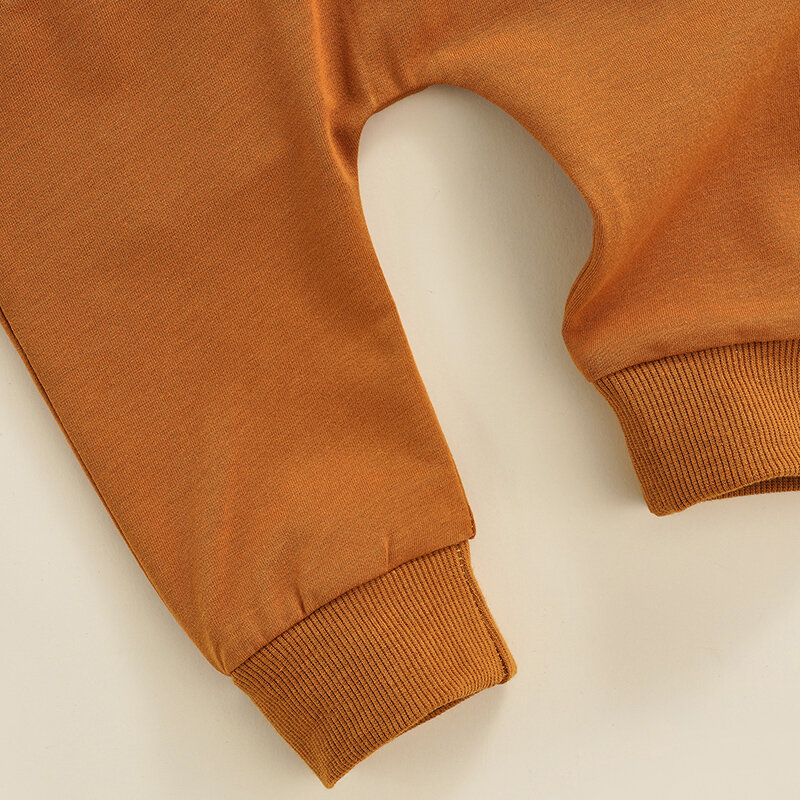 Dziecko spodnie dla chłopców i dziewcząt noworodka elastyczna talia regulowany sznurek jednolity kolor Casual luźny krój długie spodnie dla 0-3-lat