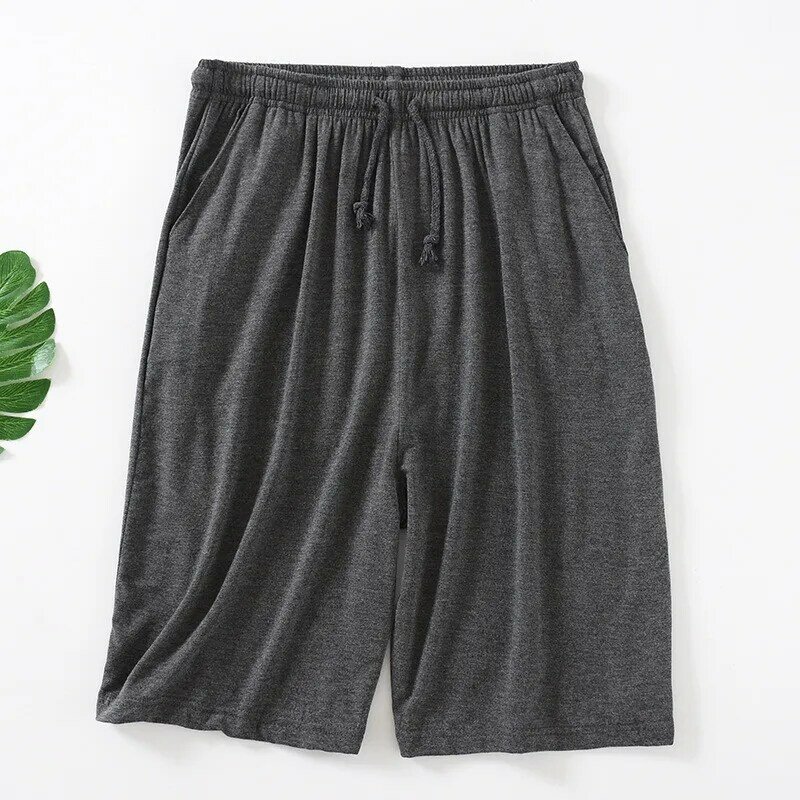 Celana piyama pria, musim panas tipis lima poin celana pendek rumah longgar kasual ukuran besar celana pantai pakaian tidur pria