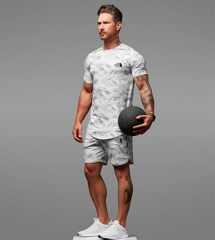 Set lengan pendek pria, set dua potong pakaian olahraga kamuflase lari kebugaran baru musim panas