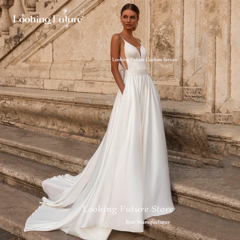 Gaun pernikahan putih sederhana gaun pengantin tali Spaghetti A-Line gaun pengantin seksi leher-v rendah berenda pita menyapu 2024 kereta