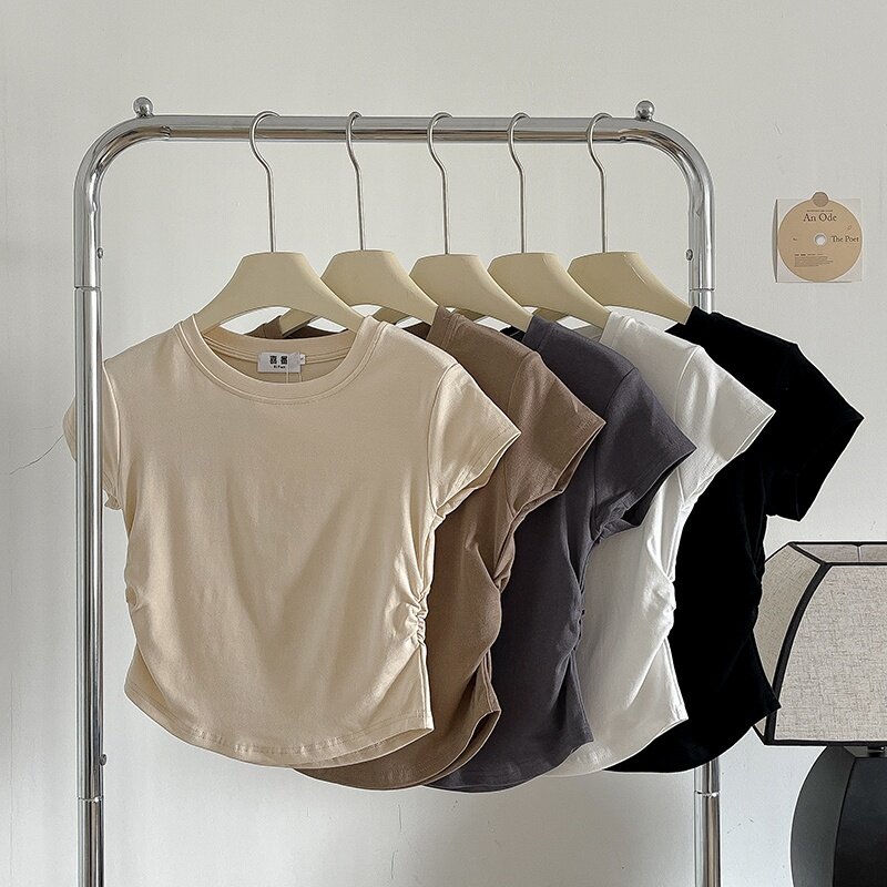 Camiseta informal de manga corta para mujer, jersey de cuello redondo que combina con todo, moda Chic de nicho, novedad de verano 2023