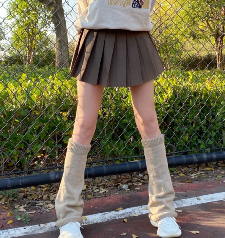 Scaldamuscoli bianchi per ragazze calze al ginocchio calde con orlo a gamba giapponese sciolto Y2K lavorato a maglia a tubo medio Lolita Jk calze lunghe copriscarpe