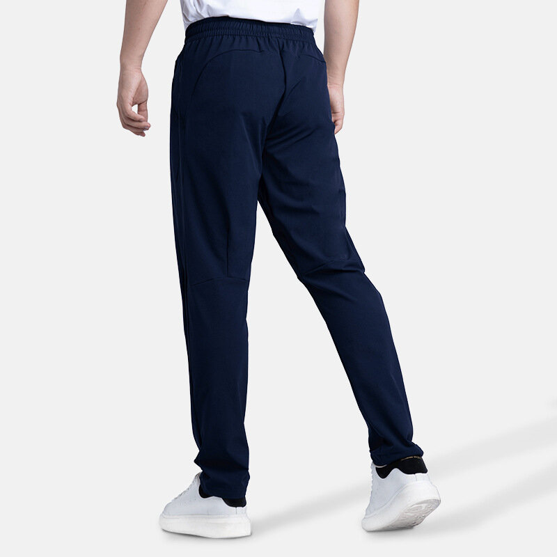 Jesienne i zimowe nowe spodnie na co dzień męskie dopasowane, proste i wszechstronne elastyczne spodnie do biegania w jednolitym kolorze